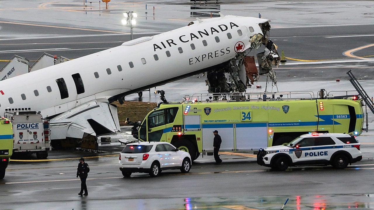 LaGuardia collision: 2 pilots killed after Air Canada jet hits fire truck,  forcing airport closure